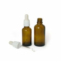 Steklenička s črno pipeto